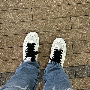 Chanel white and black flat sneakers